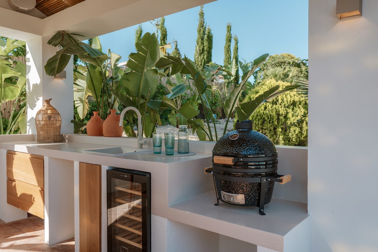 Outdoor kitchen and barbecue area of a 4-bedroom villa in Javea - The Estates