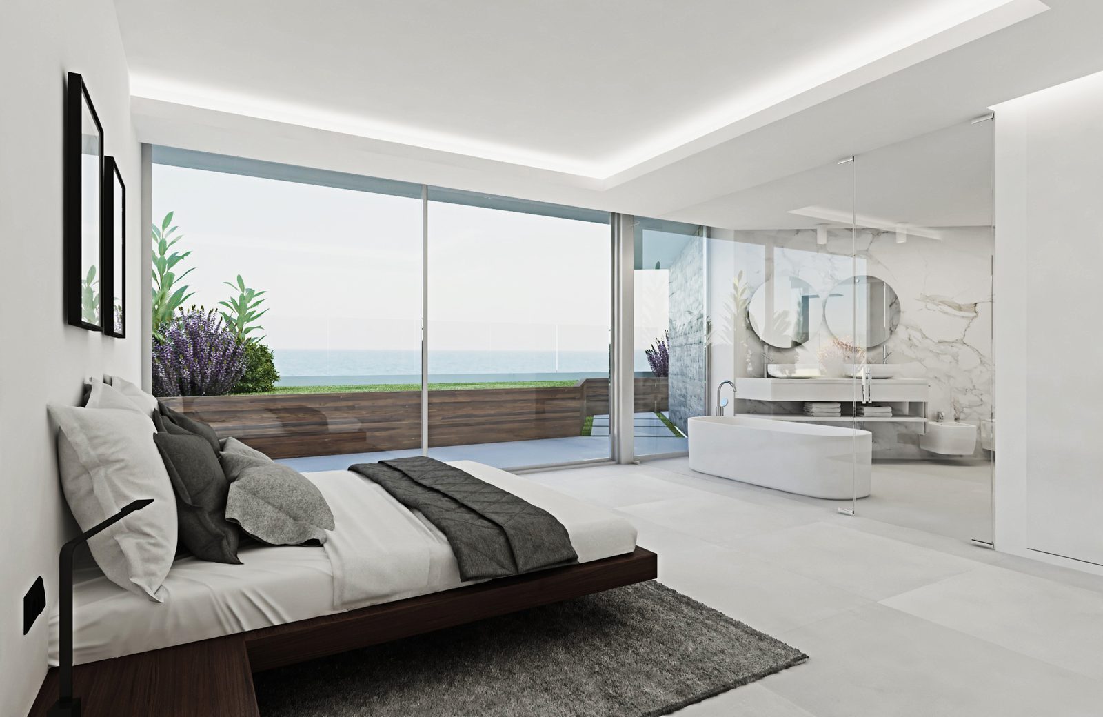 Modern bedroom with freestanding bathtub, ensuite bathroom and panoramic sea views in a 3-bedroom apartment in Calpe - The Estates