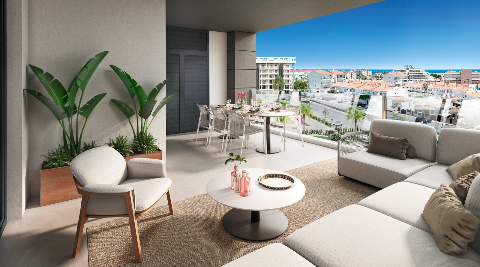 A stylish outdoor terrace with seating and dining area on a 3-bedroom penthouse in Torrevieja - The Estates