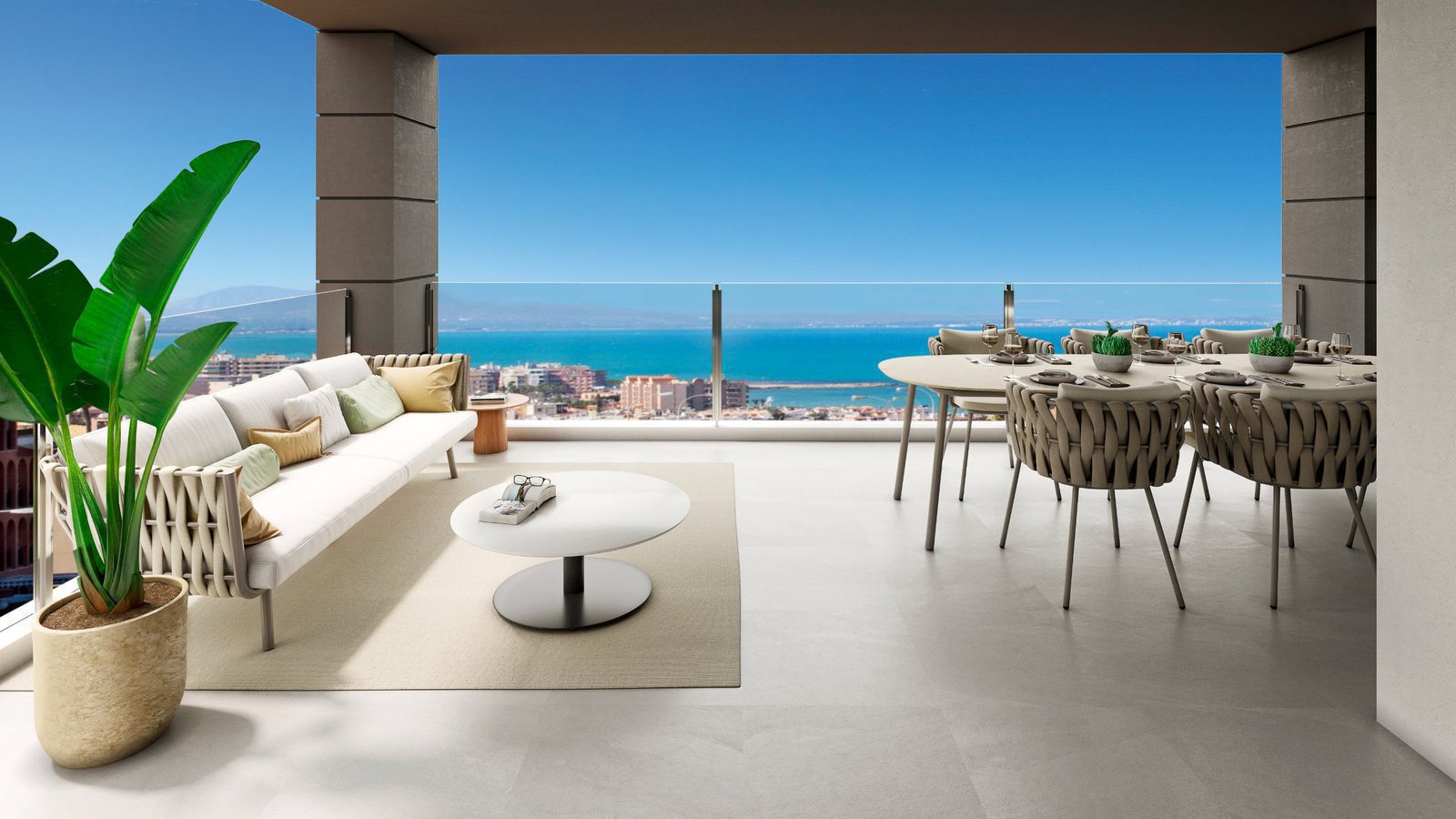 A bright living and dining area with sea views from a 3-bedroom penthouse in Torrevieja - The Estates