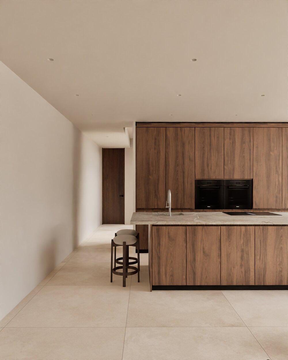 Modern kitchen with wooden cabinetry and marble countertops in a 4-bedroom villa in Denia - The Estates