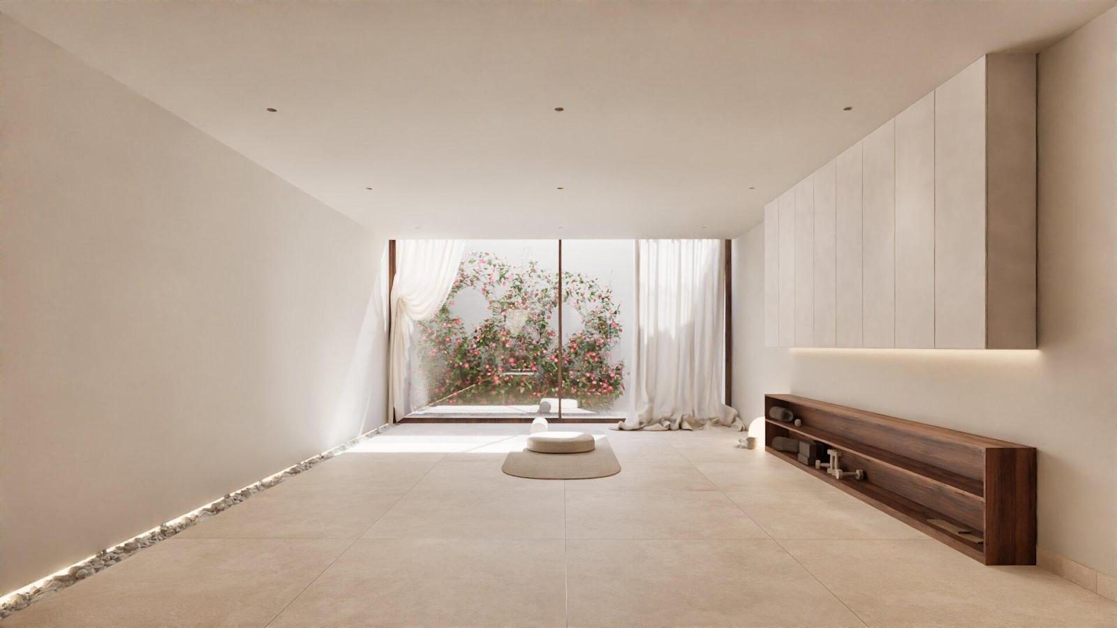 Interior view of a bright living room with garden views in a 4-bedroom villa in Denia - The Estates