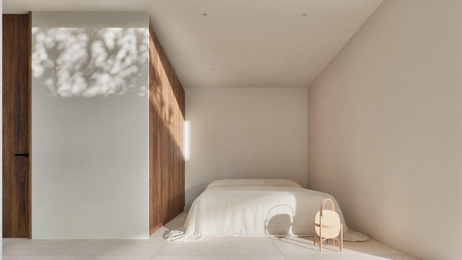 A bright bedroom with wooden accents in a 4-bedroom villa in Denia - The Estates