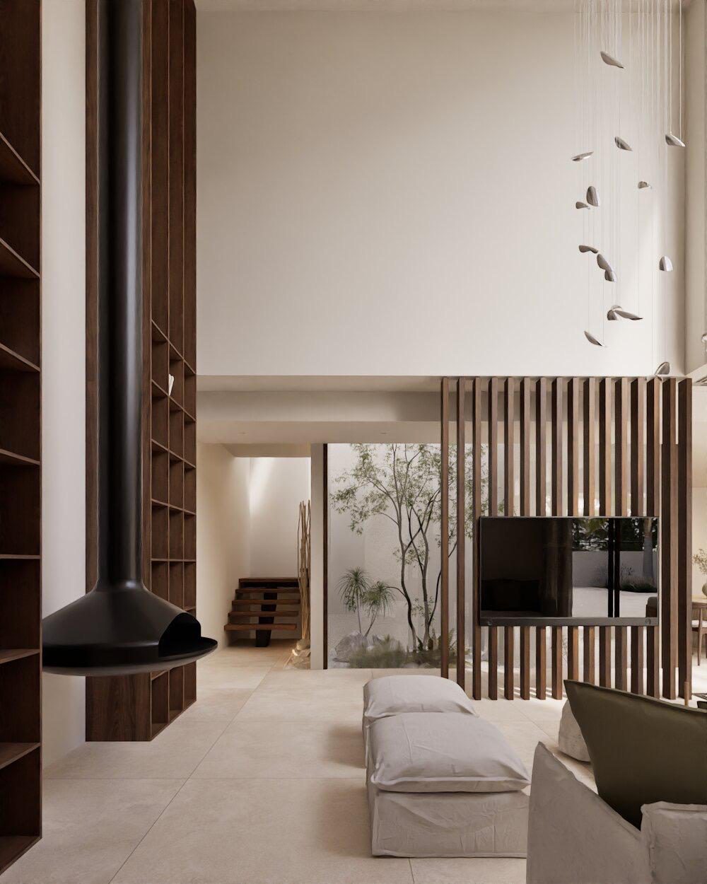 Stylish living room with a modern fireplace and garden view in a 4-bedroom villa in Denia - The Estates
