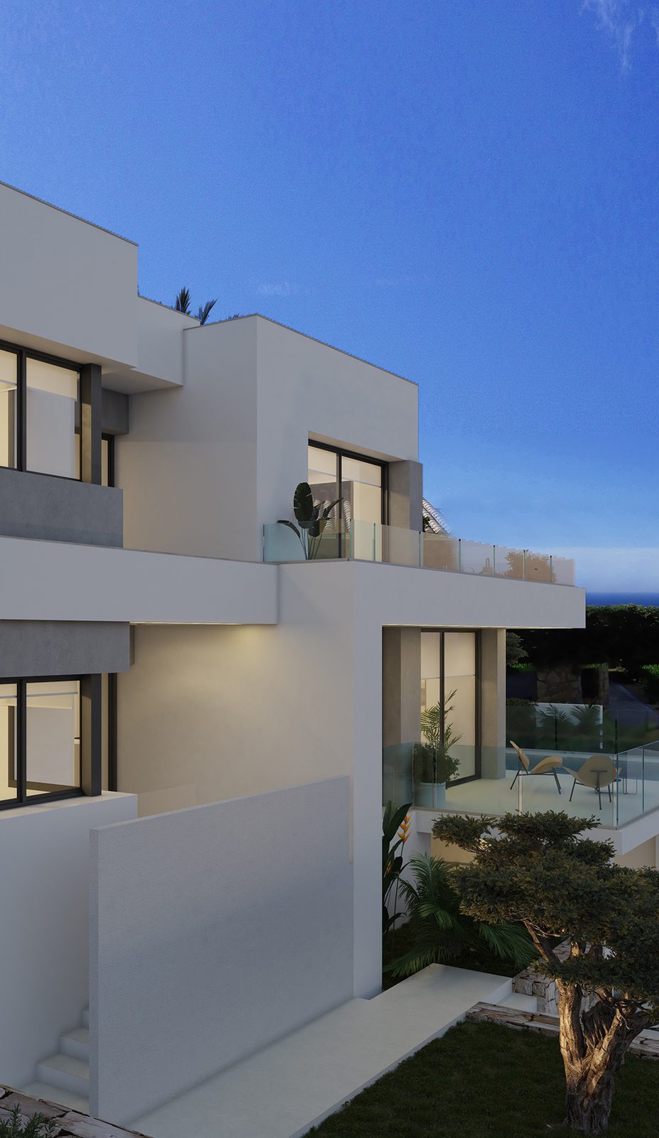 Modern villa exterior with glass balconies, landscaped garden and sea views of a 3-bedroom villa in Benitachell - The Estates