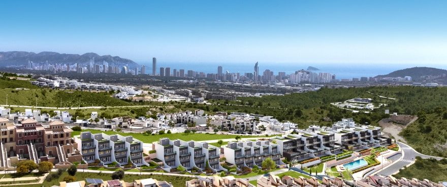 Panoramic view of townhouse development, green hills and Benidorm skyline from a 3-bedroom townhouse in Finestrat - The Estates