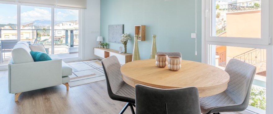 Bright open-plan dining and living room with terrace and mountain views in a 3-bedroom townhouse in Finestrat - The Estates