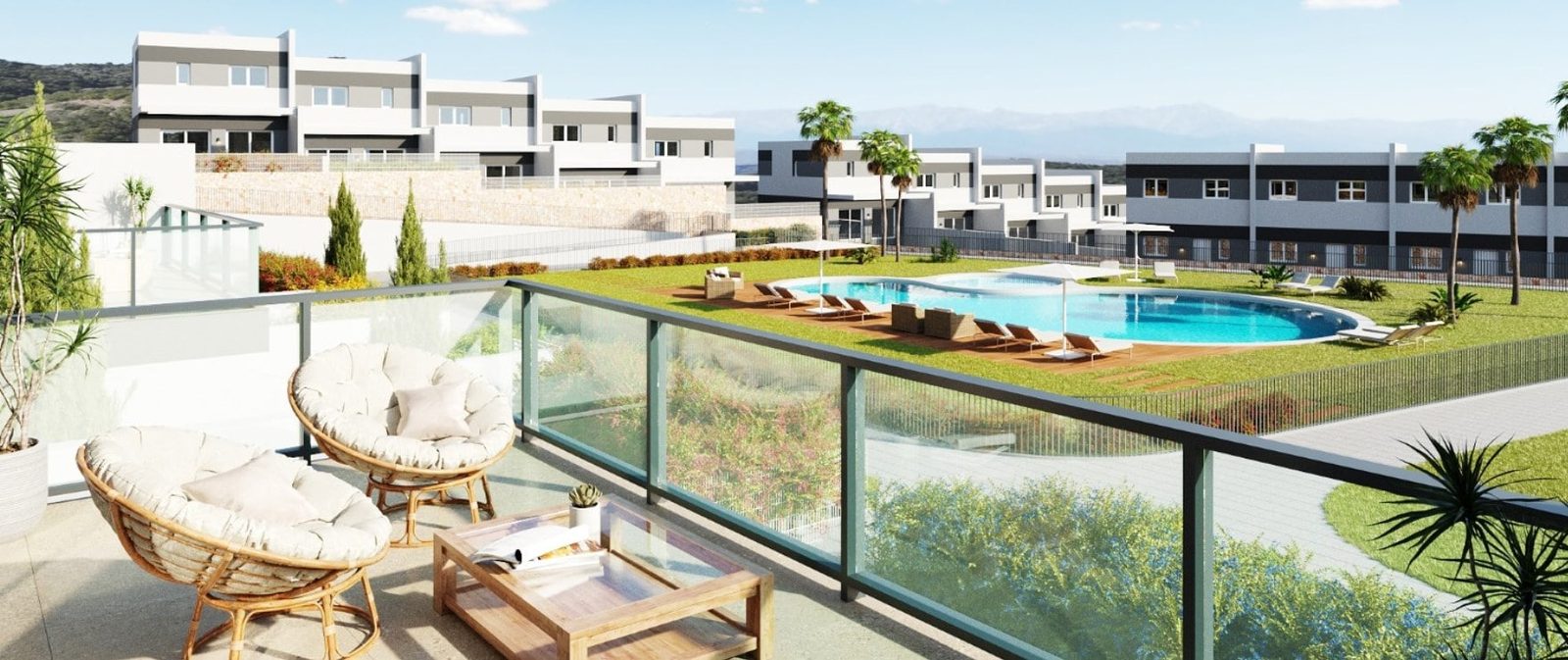 Terrace overlooking communal pools and modern townhouses of a 3-bedroom townhouse in Finestrat - The Estates