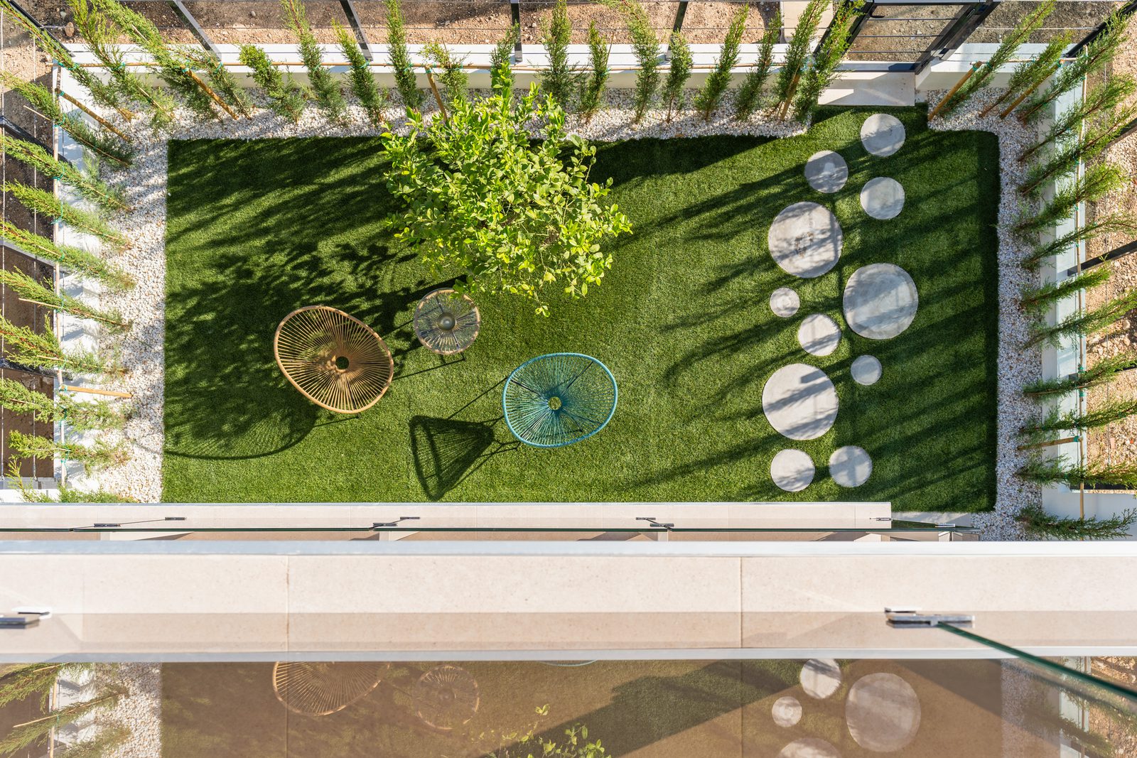 An aerial view of a beautifully landscaped garden area of a 4-bedroom townhouse in La Nucía - The Estates