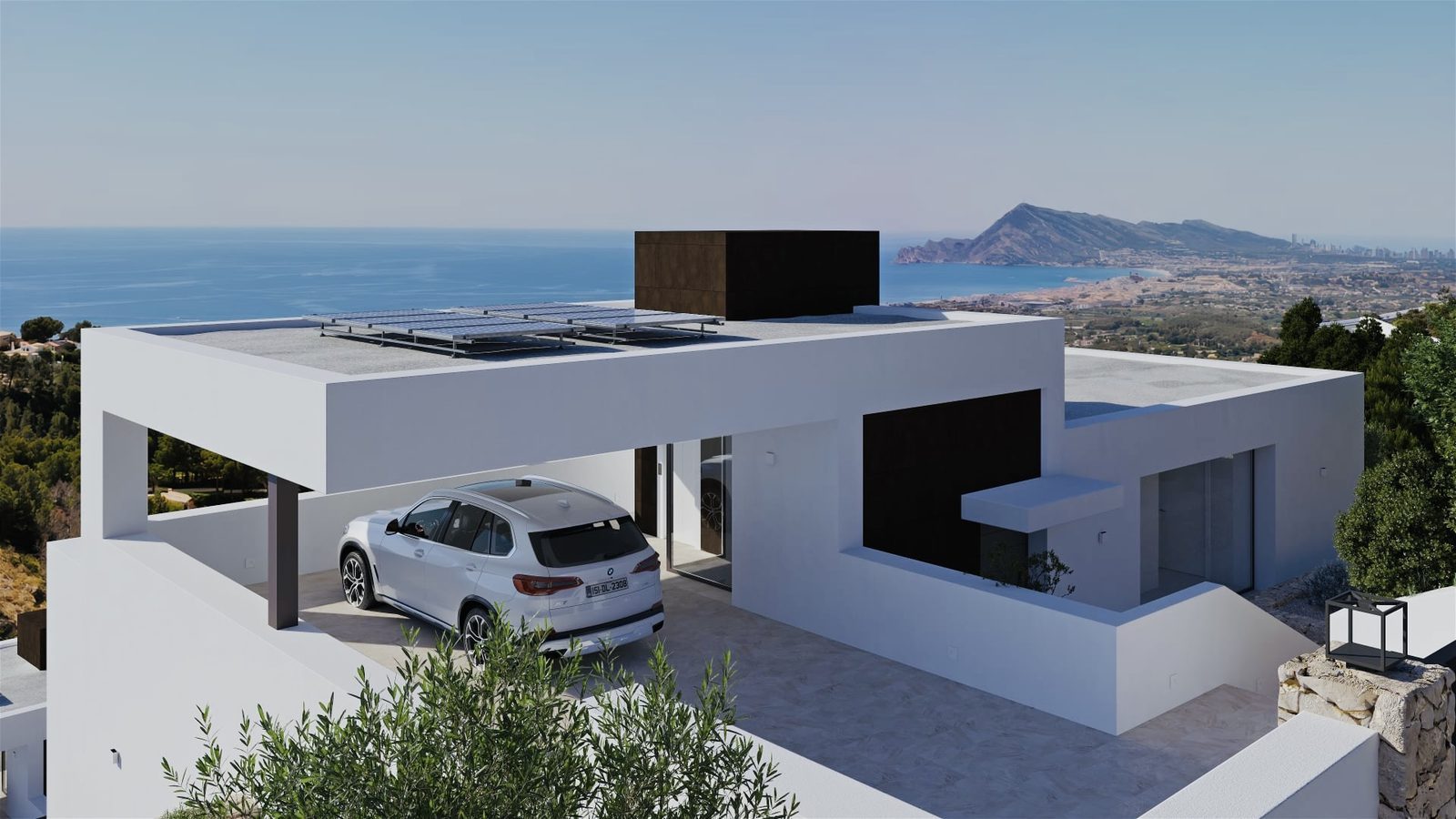 Modern villa exterior with covered parking and panoramic sea views in Sierra Altea - The Estates