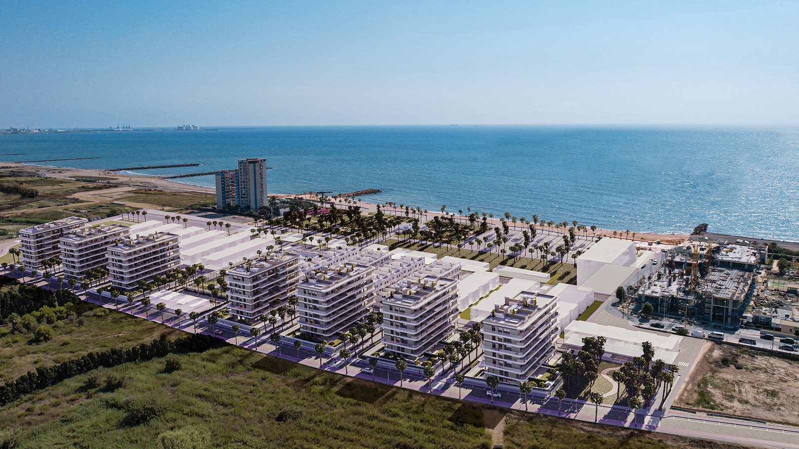 Aerial view of a beachfront residential development and promenade of a 3-bedroom penthouse in El Puig - The Estates