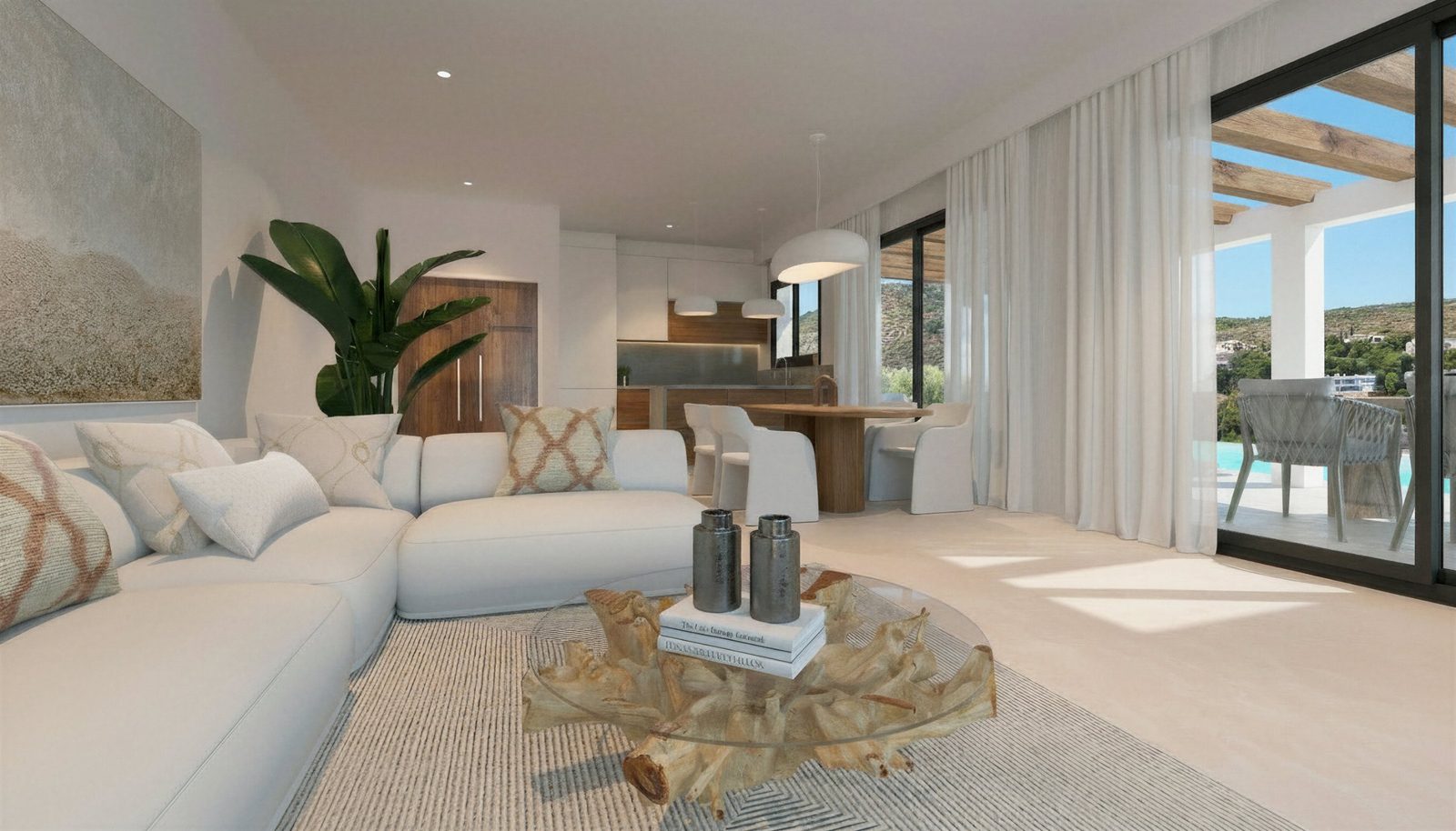 Open-plan living room, kitchen and dining area with pool and mountain views of a 4-bedroom villa in Pedreguer —