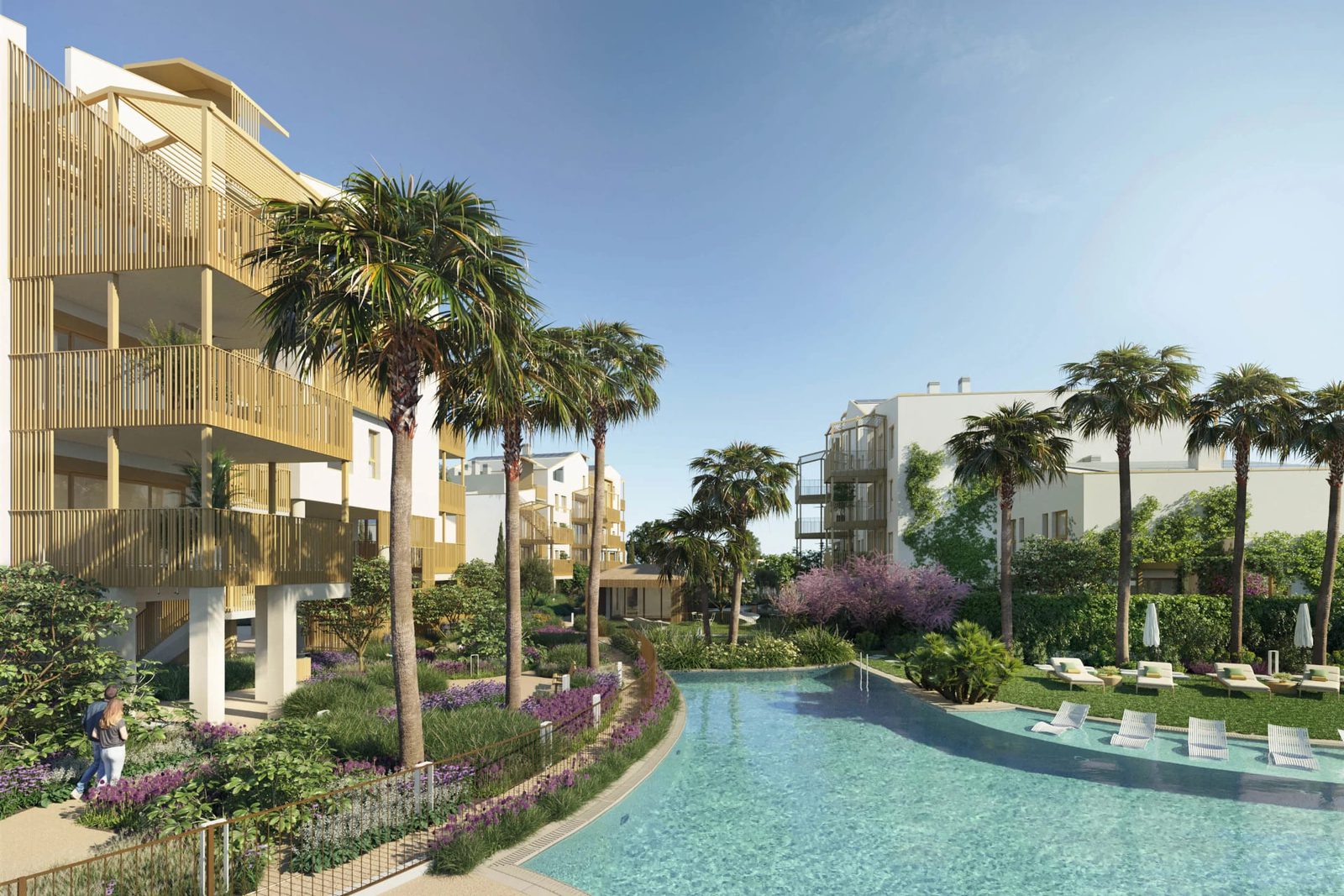 A view of the pool and gardens surrounding a 2-bedroom penthouse in El Verger - The Estates