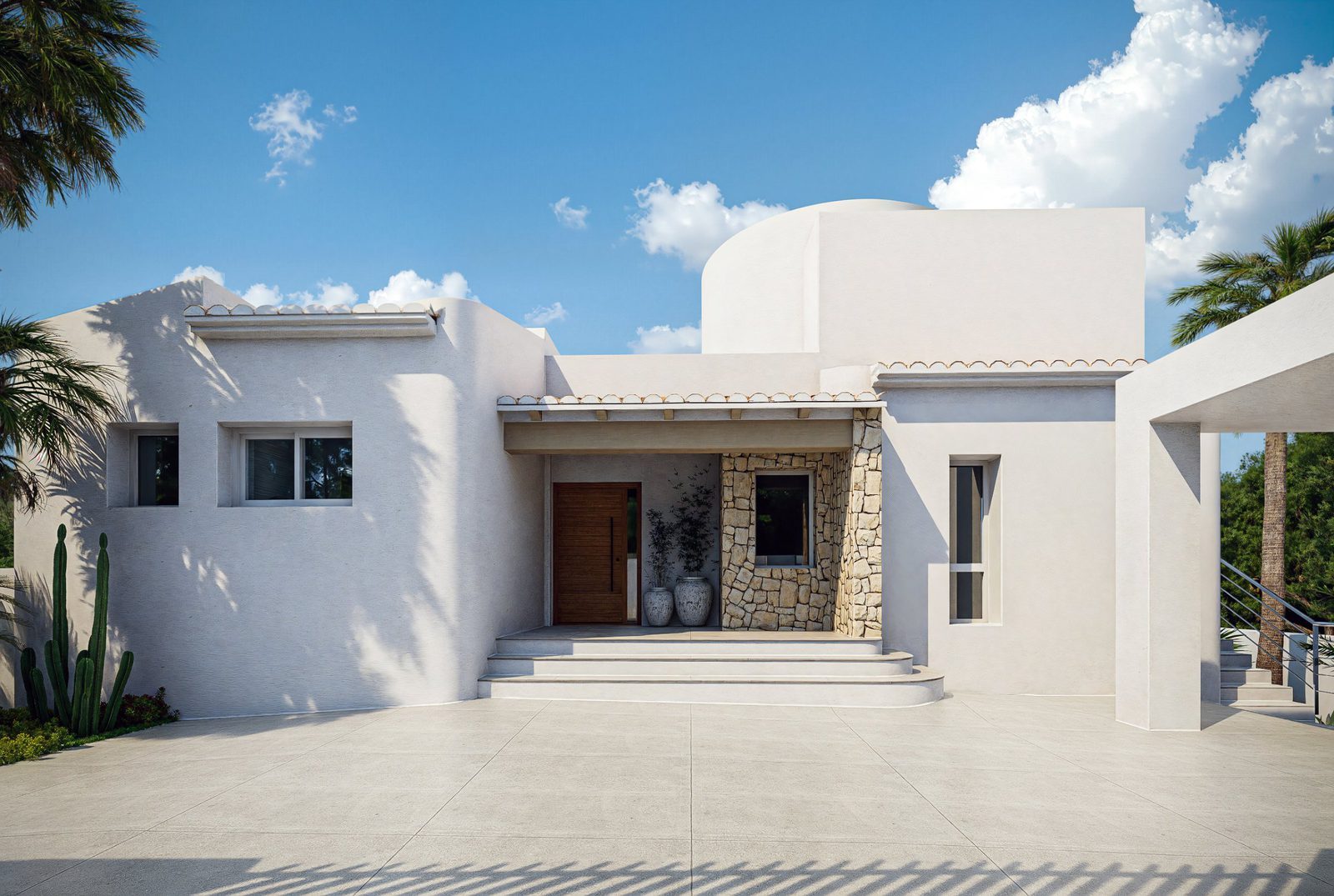 White villa entrance with stone detailing, steps and palm trees in Altea - The Estates