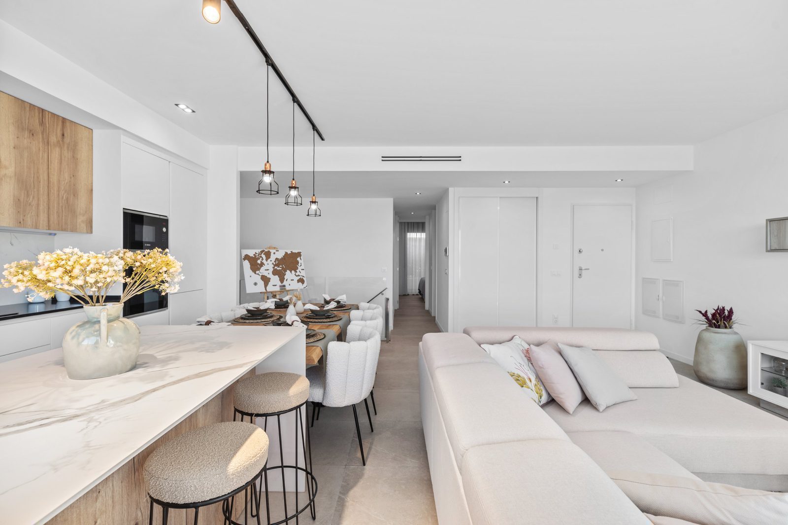 Stylish living and dining area of a 2-bedroom apartment in Finestrat - The Estates