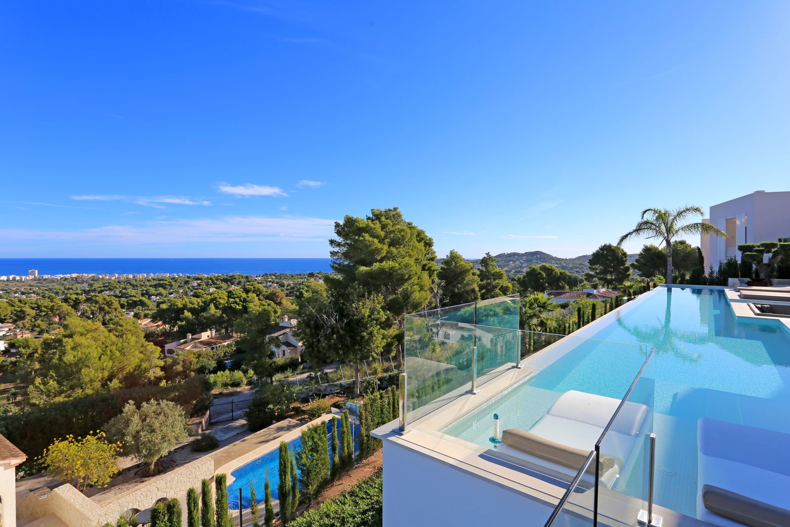 Stunning sea and mountain views from the pool of a 4-bedroom villa in Javea - The Estates