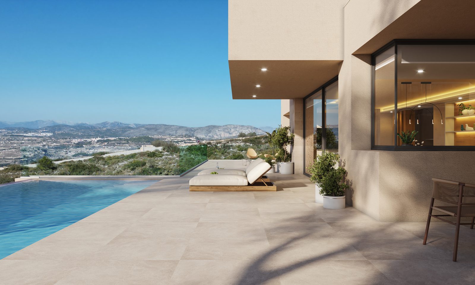 Infinity pool terrace and panoramic mountain views at a modern 4-bedroom villa in Benitachell - The Estates