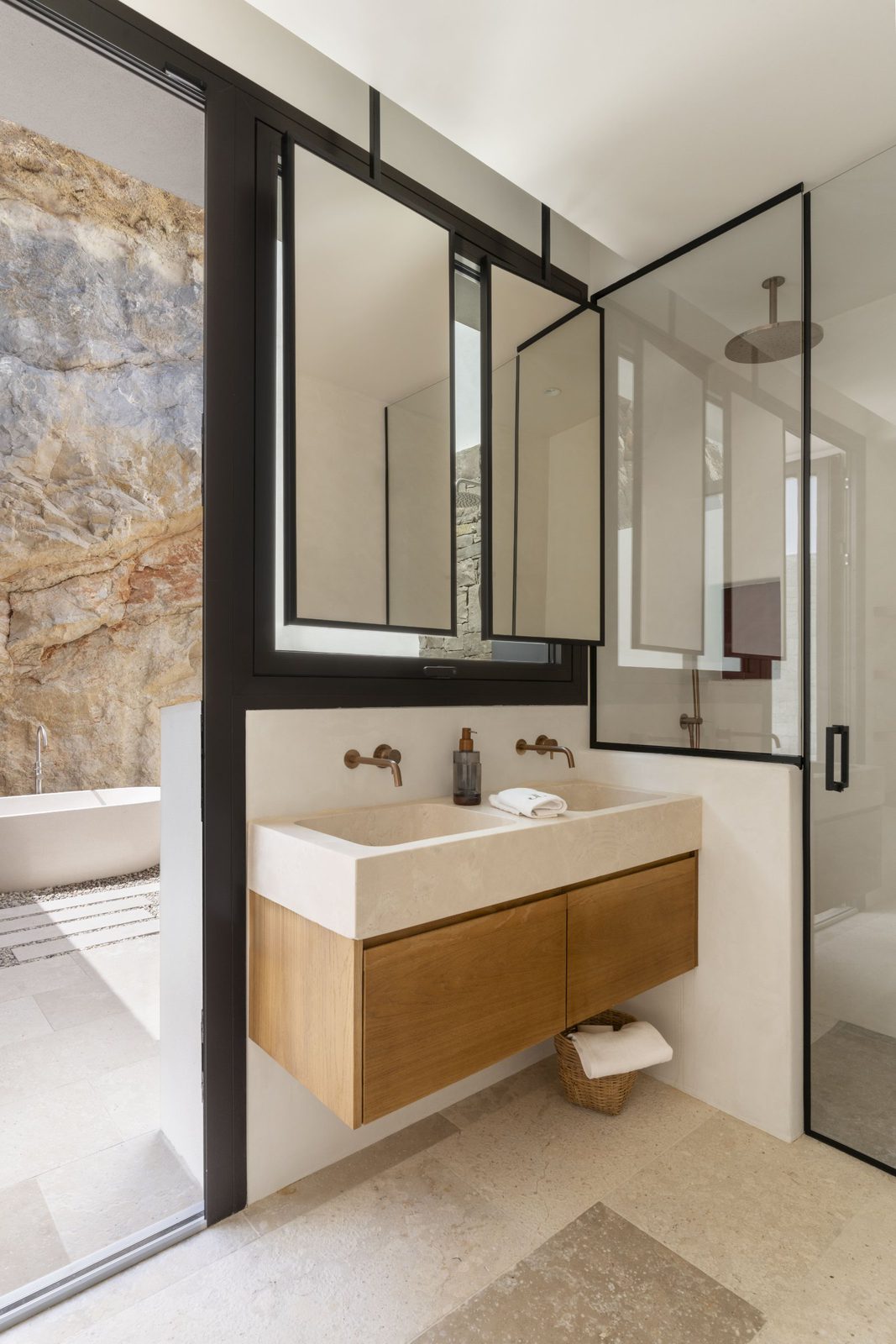 Modern bathroom design with stone accents in a 5-bedroom villa in Javea - The Estates