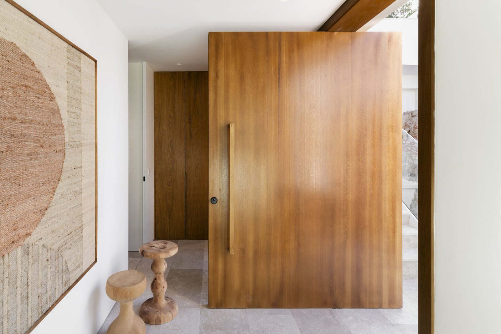 A stylish wooden door and interior details of a 5-bedroom villa in Javea - The Estates