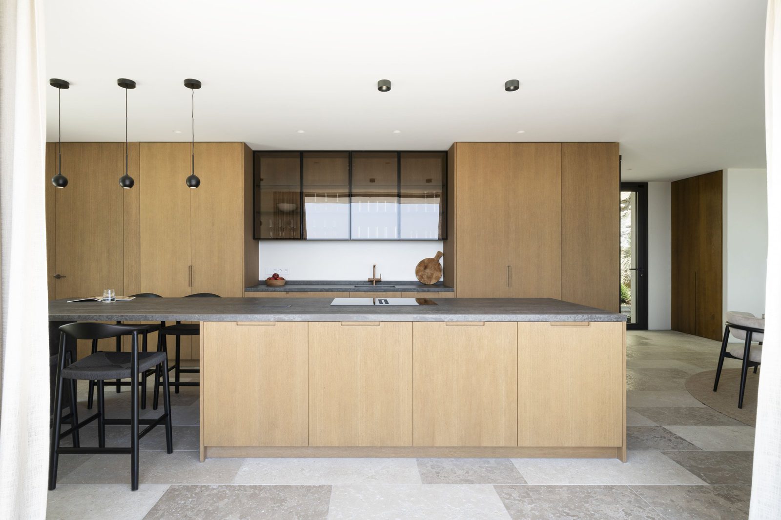 Modern kitchen with island in a 5-bedroom villa in Javea - The Estates