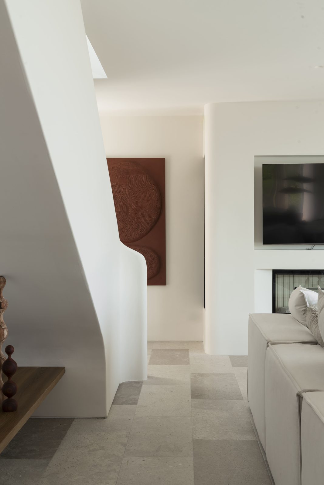 Stylish living room interior with modern art and a TV in a 5-bedroom villa in Javea - The Estates