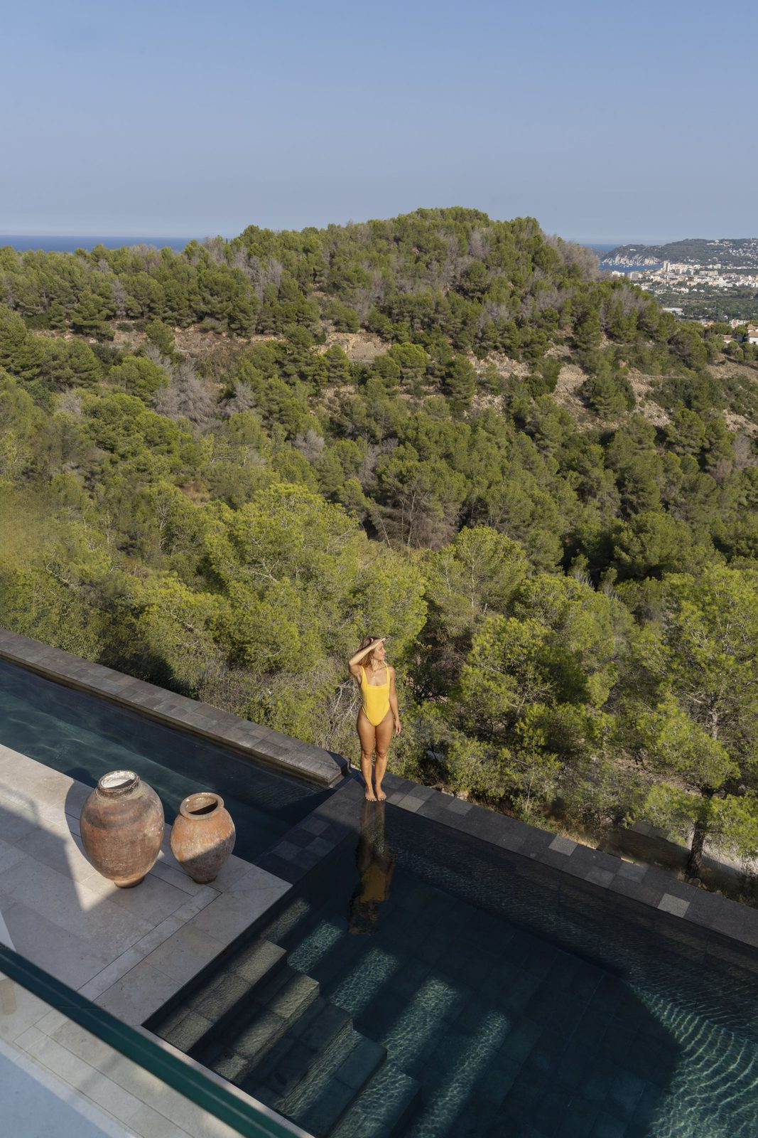 Stunning sea, mountain, and city views from the pool of a 5-bedroom villa in Javea - The Estates