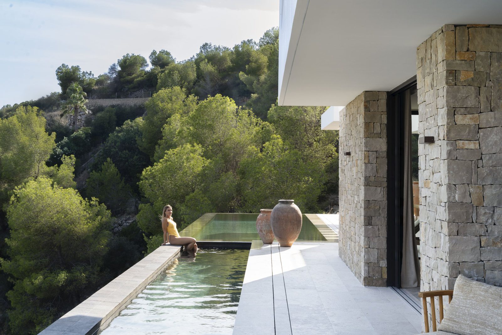 Infinity pool and terrace with stunning mountain and countryside views of a 5-bedroom villa in Javea - The Estates