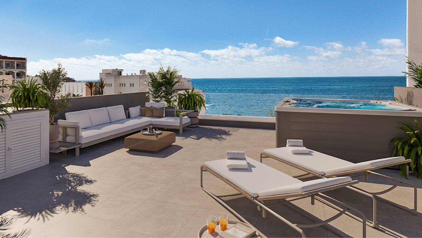 Rooftop terrace with sea views, lounge seating, sun loungers and a hot tub of a 3-bedroom apartment in Colonia de Sant Jordi - The Estates