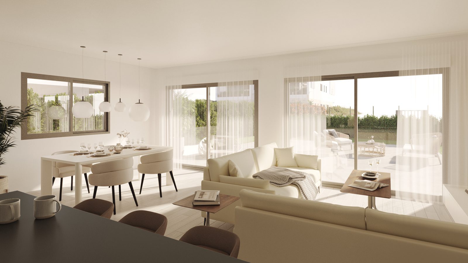 Bright open-plan living and dining area with large windows opening onto a sunny terrace of a 3-bedroom apartment in Colonia de Sant Jordi - The Estates