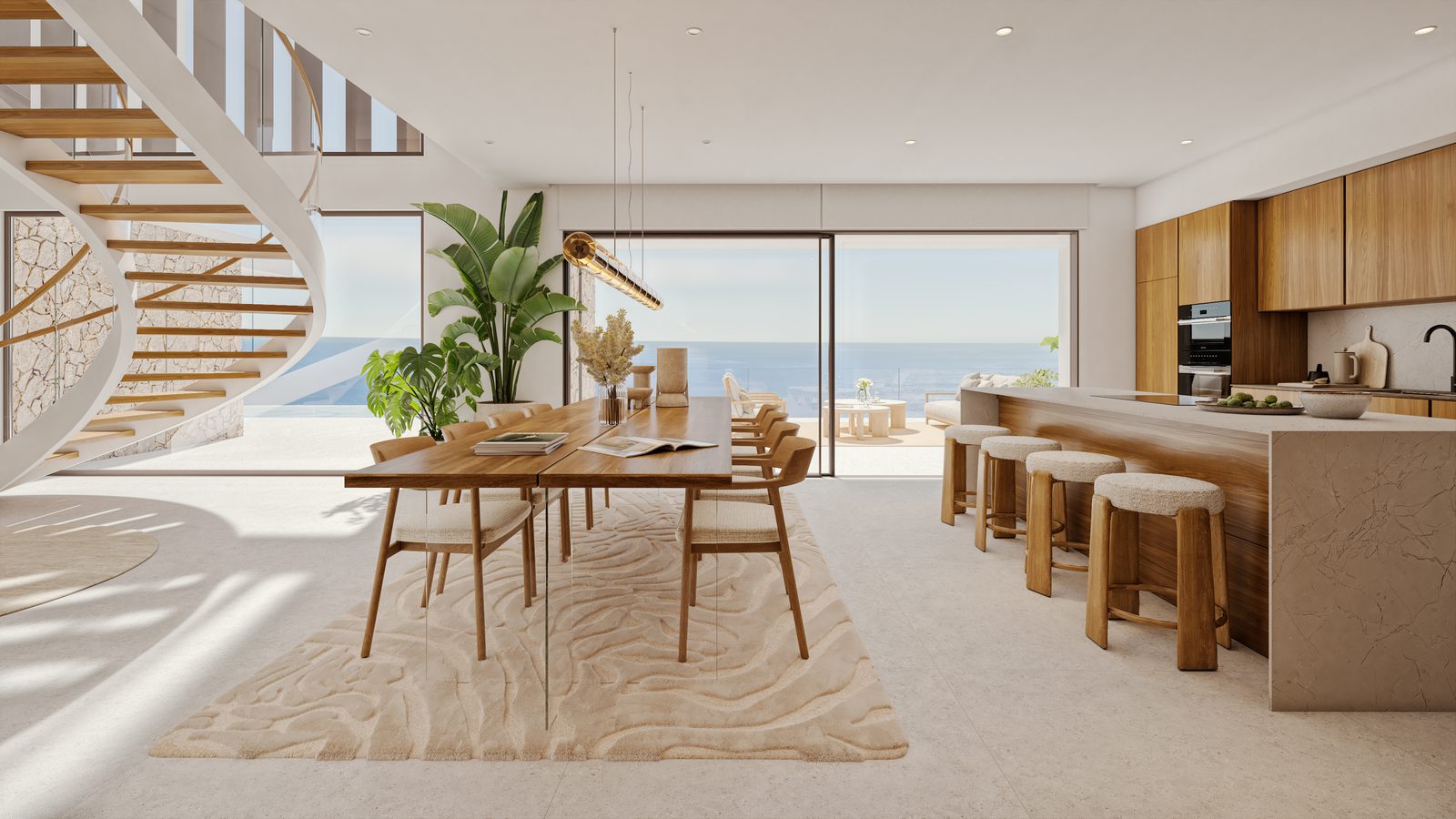Modern kitchen and dining area with stunning sea views of a 4-bedroom villa in Benitachell - The Estates