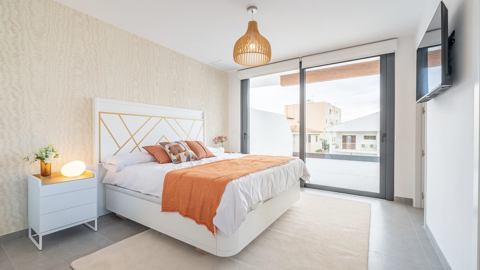 Stylish bedroom with patio doors in a 3-bedroom semi-detached in Capdepera - The Estates