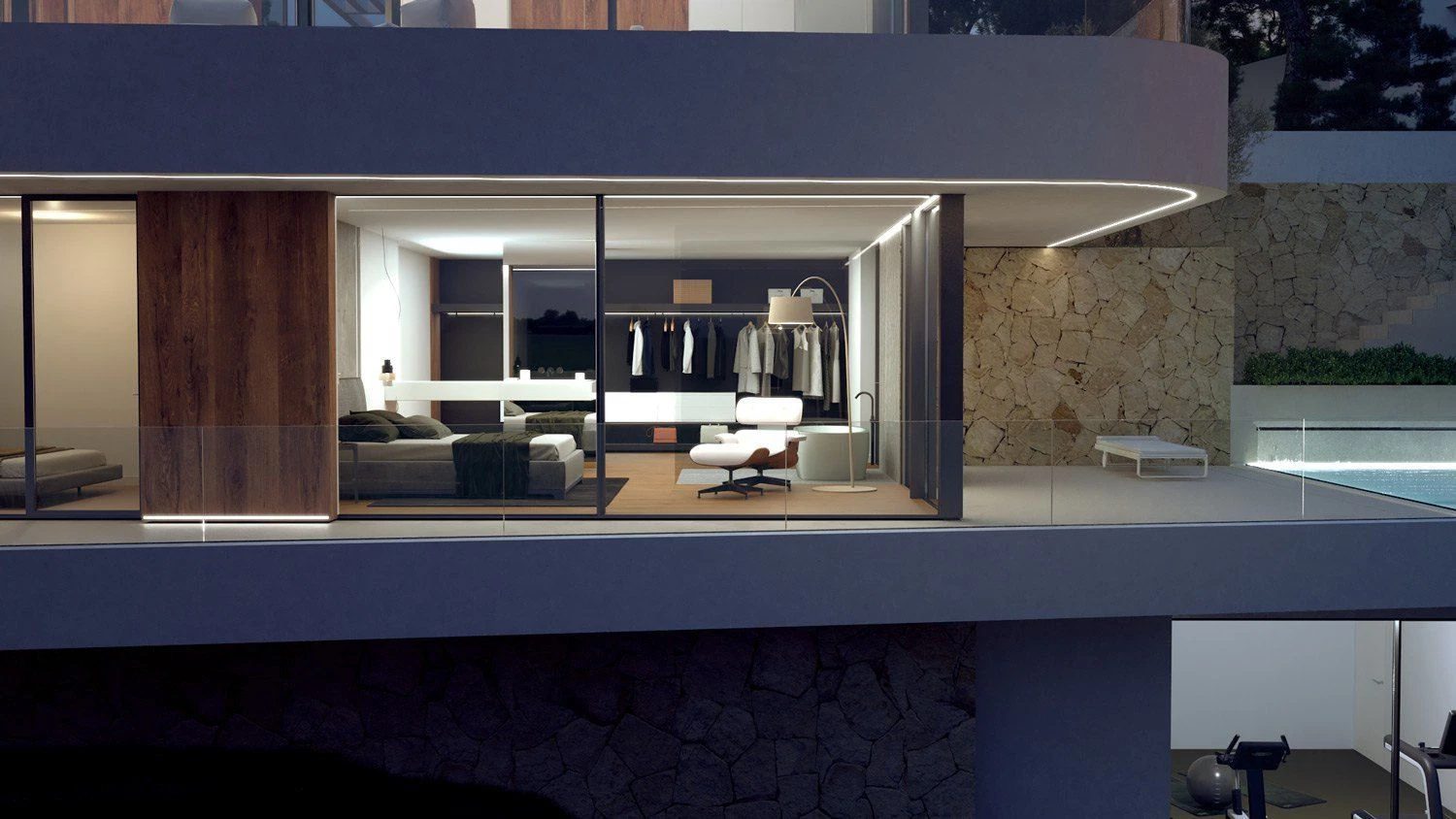 Stylish interior with a walk-in wardrobe and pool view of a 4-bedroom villa in Moraira - The Estates