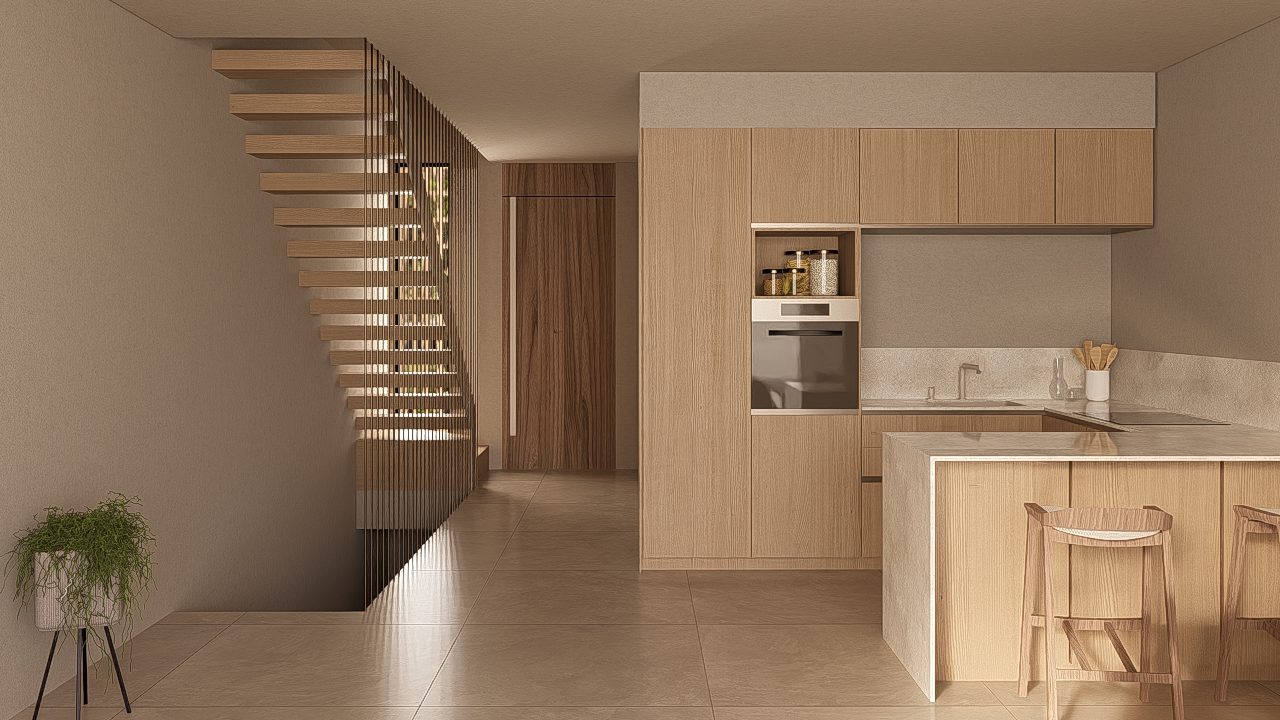 Modern kitchen with wooden cabinetry and a breakfast bar in a 3-bedroom apartment in Jávea - The Estates