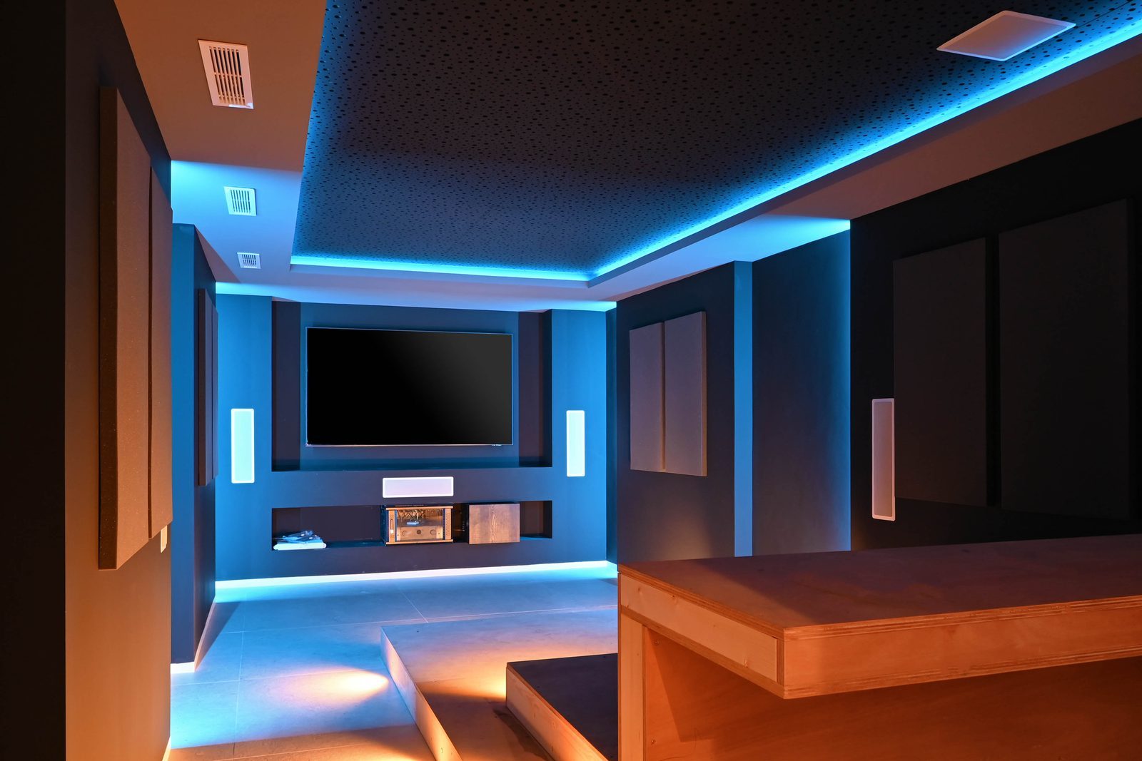 Home cinema with blue ambient lighting in a 4-bedroom villa in Benissa - The Estates