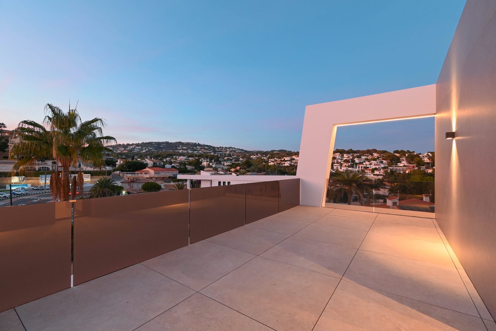 Terrace with glass balustrade and hillside views of a 4-bedroom villa in Benissa - The Estates