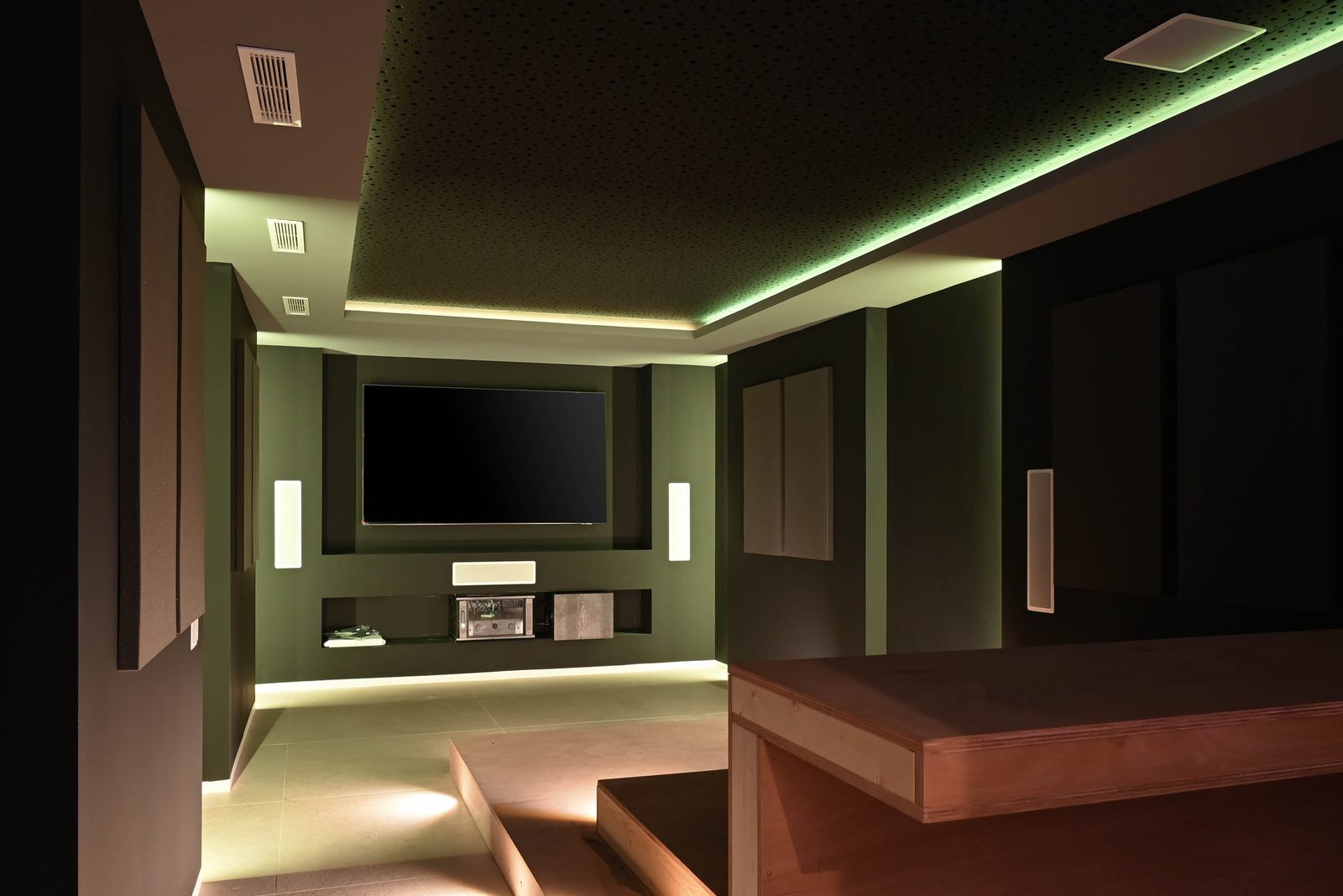 Home cinema with wall-mounted screen and ambient lighting in a 4-bedroom villa in Benissa - The Estates