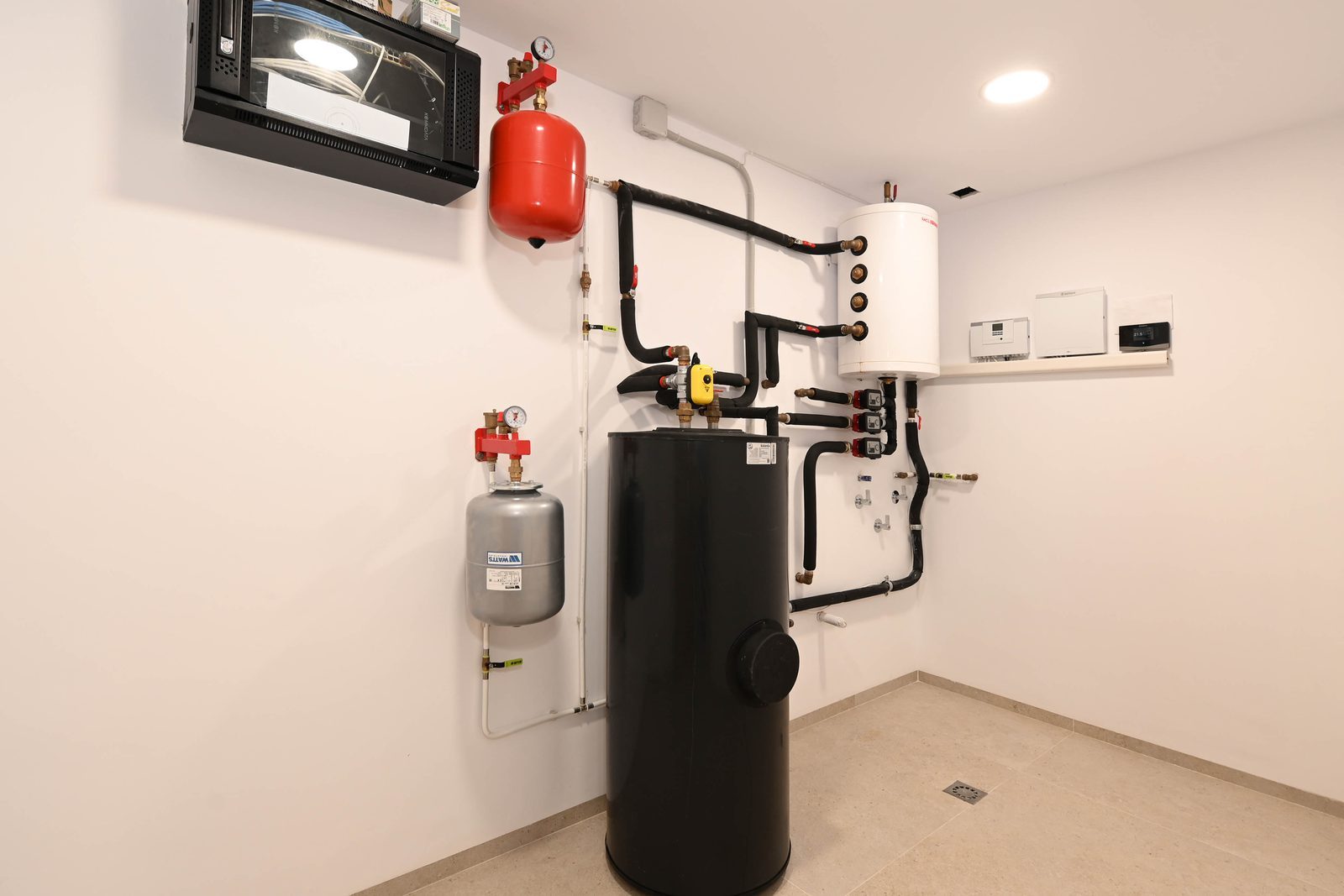 Utility room with heating and hot water systems of a 4-bedroom villa in Benissa - The Estates