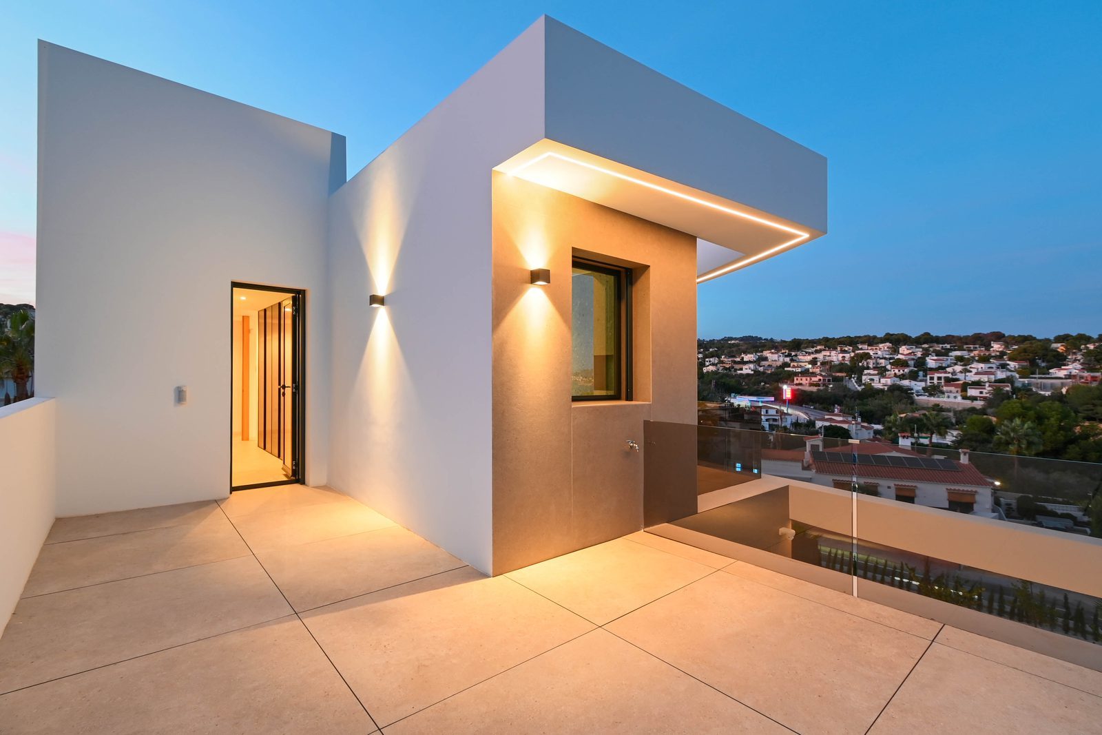 Modern villa terrace with illuminated architectural details and elevated views of Benissa of a 4-bedroom villa in Benissa — The