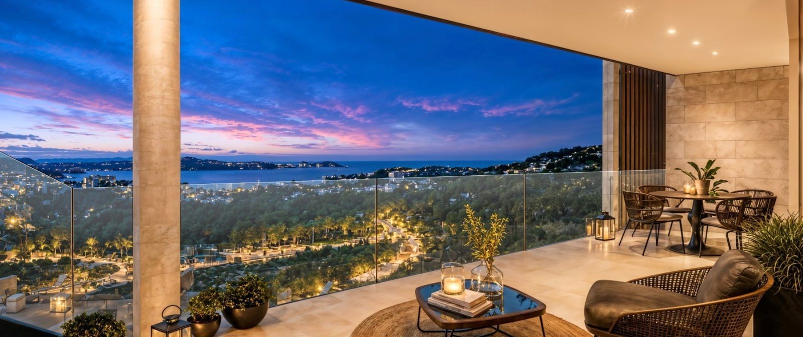 A furnished terrace with sea views at dusk in a 2-bedroom apartment in Calvia - The Estates