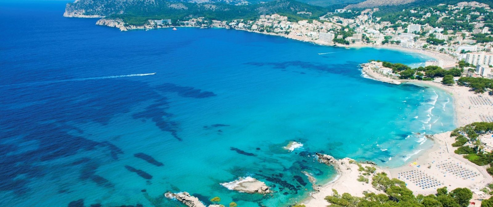 Aerial view of turquoise bays, beaches and coastline of a 2-bedroom