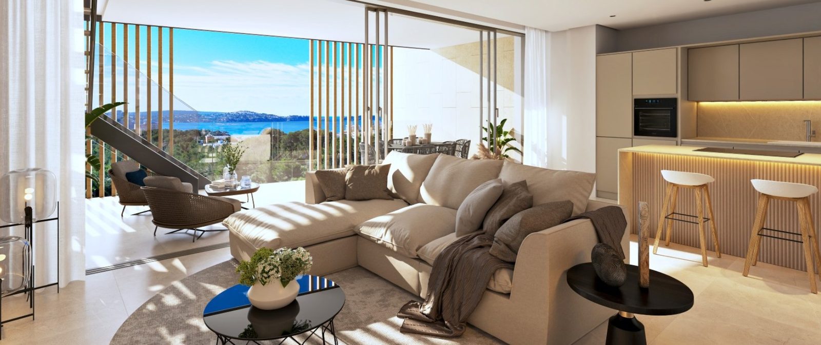 Open-plan living room and kitchen with sea views in a 2-bedroom apartment in Calvia - The Estates