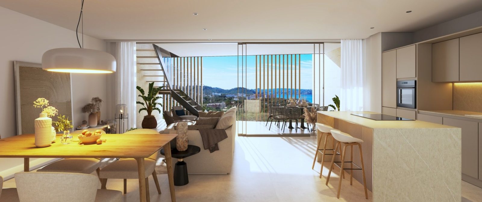 Open-plan living, dining and kitchen with sea views in a 2-bedroom apartment in Calvia - The Estates