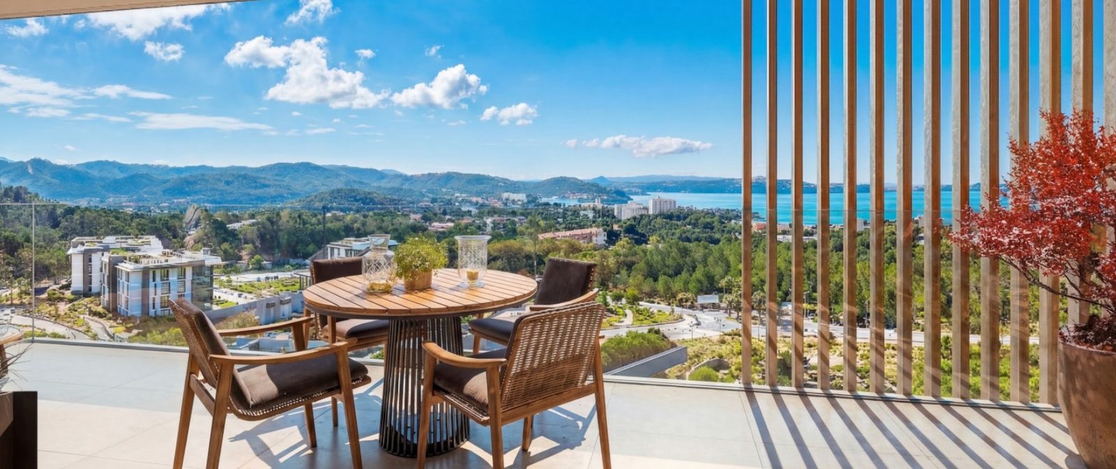 Terrace dining area with mountain and sea views at a 2-bedroom apartment in Calvia - The Estates