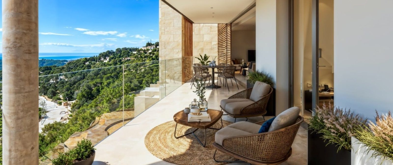 Sea-view terrace with lounge and dining areas of a 2-bedroom apartment in Calvia - The Estates