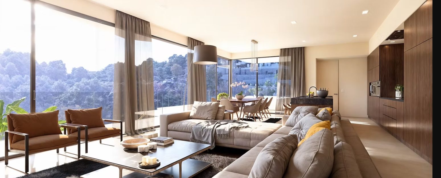 Contemporary open-plan living and dining room with kitchen and panoramic views in a 4-bedroom villa in Benissa - The Estates