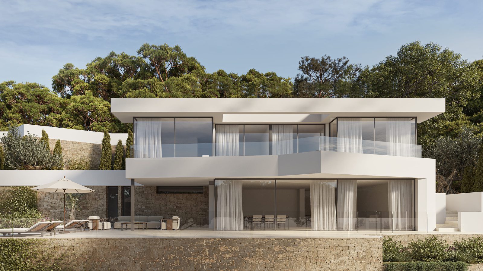 Modern white villa with glass walls, terraces and landscaped grounds in Racó de Gal