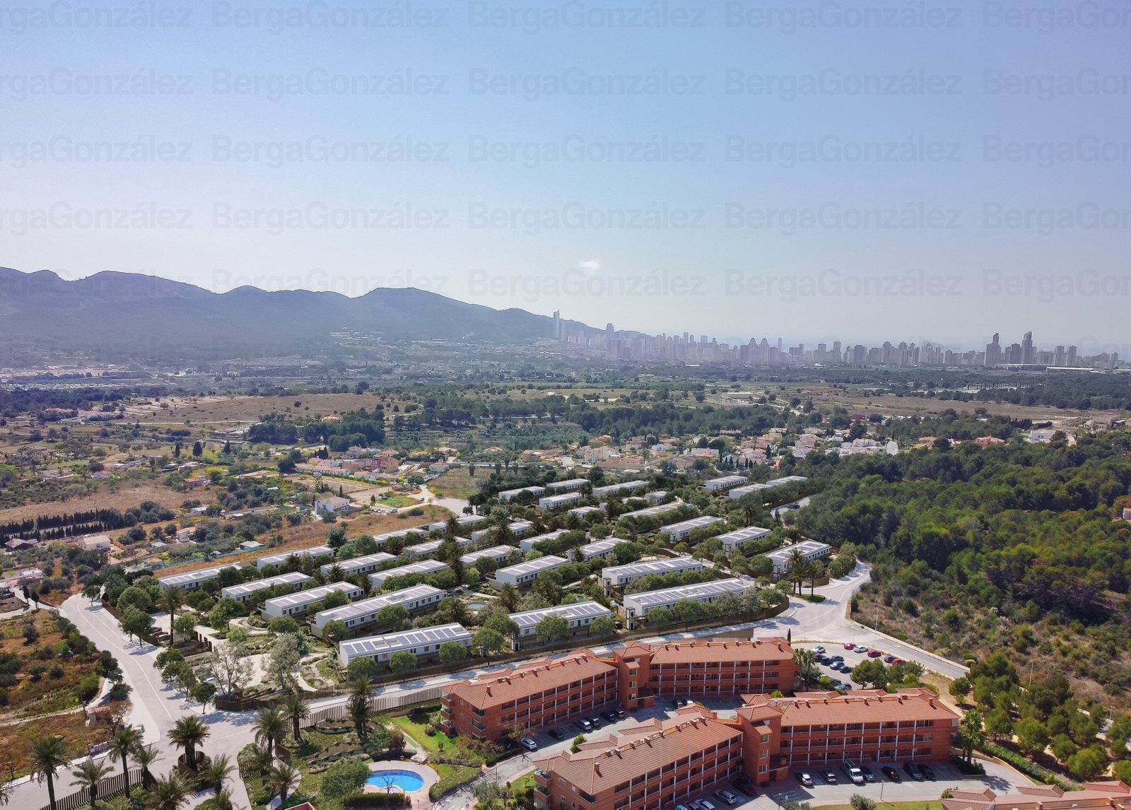 Scenic views of a garden and townscape from a 1-bedroom apartment in Alfaz del Pi - The Estates