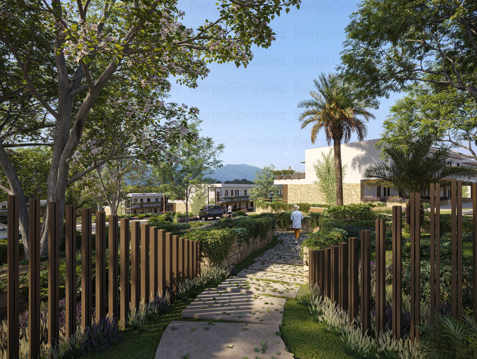 Landscaped garden pathway and apartment buildings with mountain views of a 3-bedroom apartment in Alfaz del Pi - The Estates