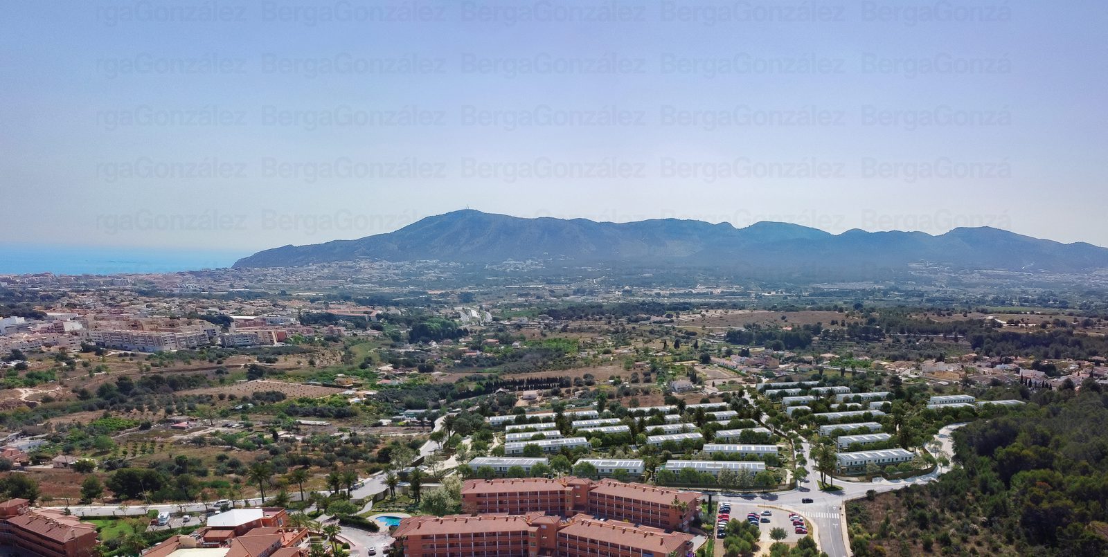 Panoramic garden and mountain views from a