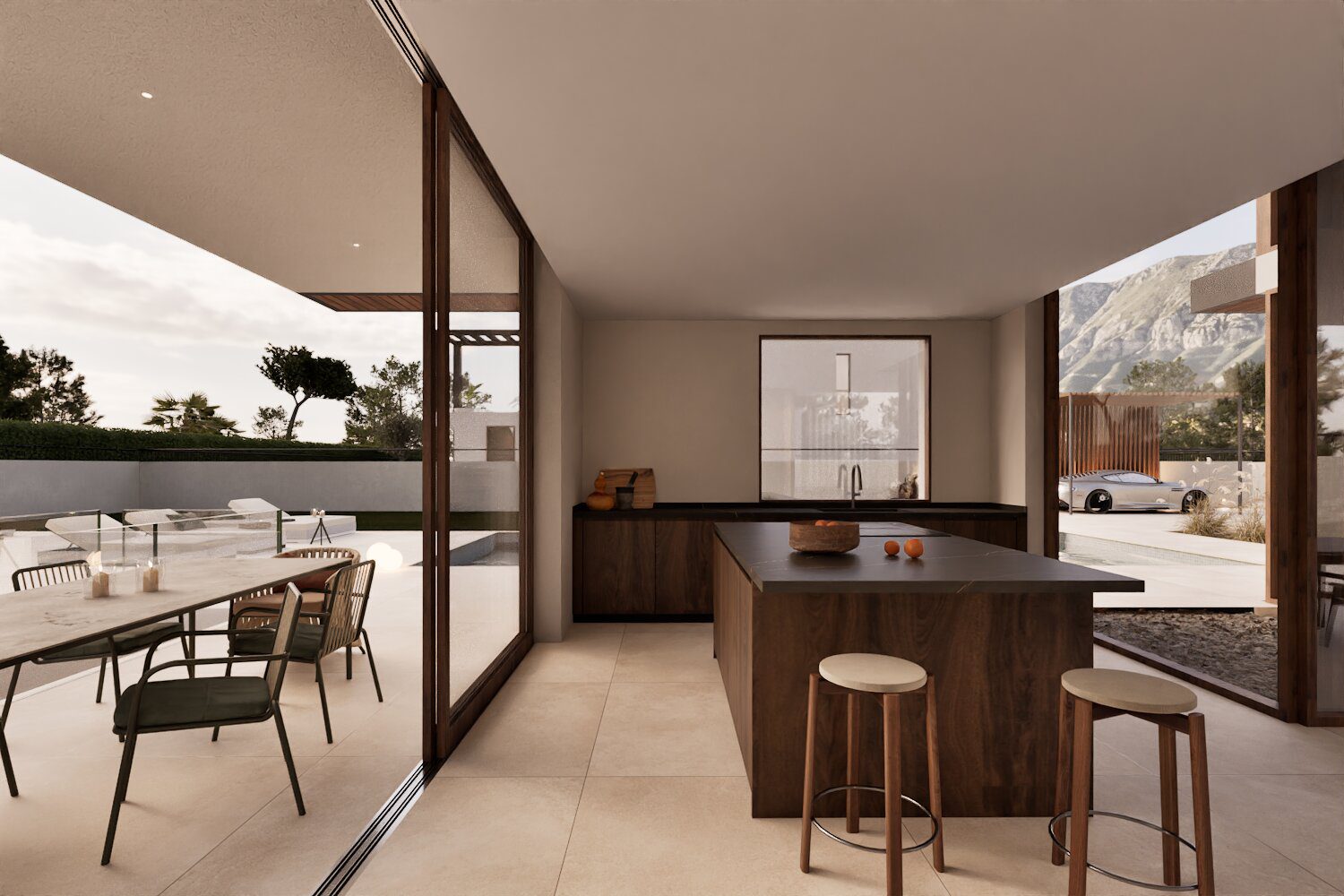 Modern kitchen and outdoor dining area with mountain views in a 3-bedroom villa in Denia - The Estates